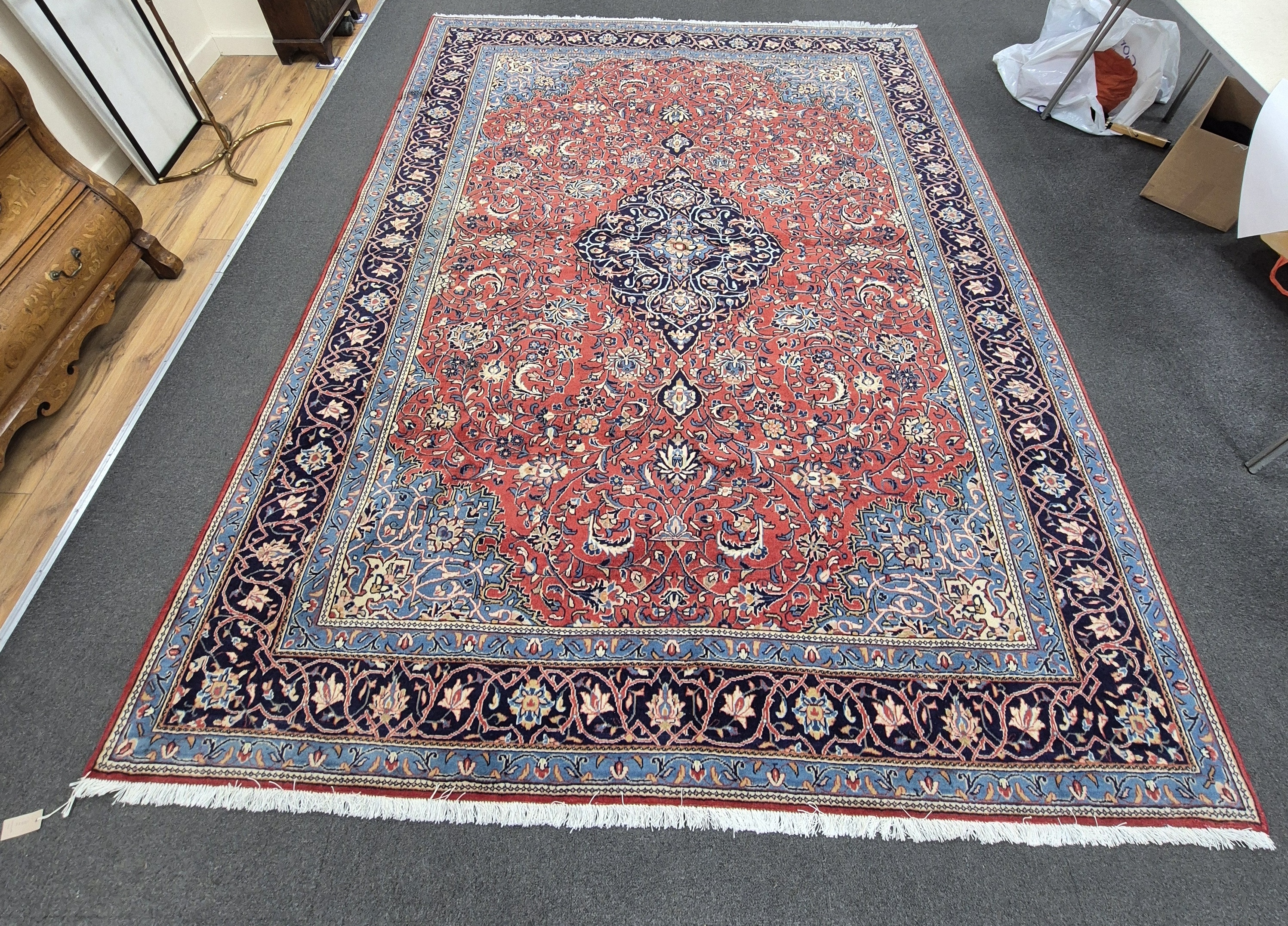 A Sarough brick red ground carpet, 340 x 250cm. Condition - good